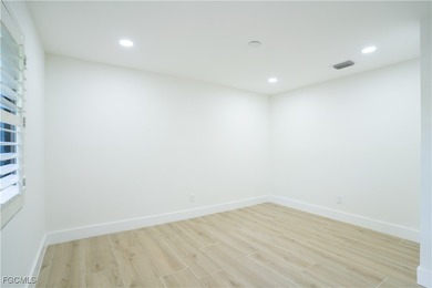 Step inside this freshly remodeled 3-bed, 2-bath pool home with on The Forest Country Club in Florida - for sale on GolfHomes.com, golf home, golf lot