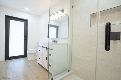 Step inside this freshly remodeled 3-bed, 2-bath pool home with on The Forest Country Club in Florida - for sale on GolfHomes.com, golf home, golf lot