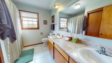 Welcome to this charming, custom-built multi-level home on Cedar Pointe Golf Course in Iowa - for sale on GolfHomes.com, golf home, golf lot