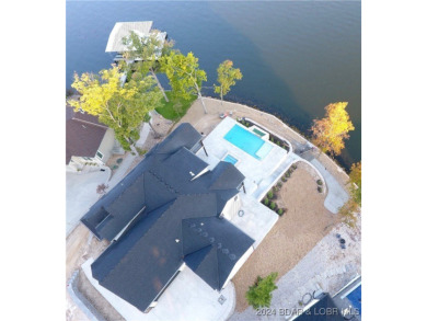 Welcome to this new construction home in Porto Cima @ Lake of on The Club At Porto Cima in Missouri - for sale on GolfHomes.com, golf home, golf lot