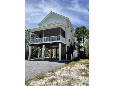 This charming elevated beach house located 3 blocks fromthe Gulf on Kiva Dunes Golf Club in Alabama - for sale on GolfHomes.com, golf home, golf lot