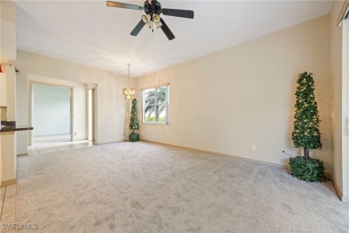 Maintenance-Free Living in Prime Naples Location - First Floor on Glen Eagle Golf and Country Club in Florida - for sale on GolfHomes.com, golf home, golf lot