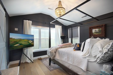 Tucked along the peaceful waters of Chincoteague Bay, this on Captains Cove Golf and Yacht Club in Virginia - for sale on GolfHomes.com, golf home, golf lot