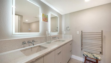 Step into coastal elegance in this fully renovated three-bedroom on Longboat Key Golf Club Resort in Florida - for sale on GolfHomes.com, golf home, golf lot