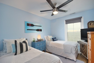 Tucked along the peaceful waters of Chincoteague Bay, this on Captains Cove Golf and Yacht Club in Virginia - for sale on GolfHomes.com, golf home, golf lot