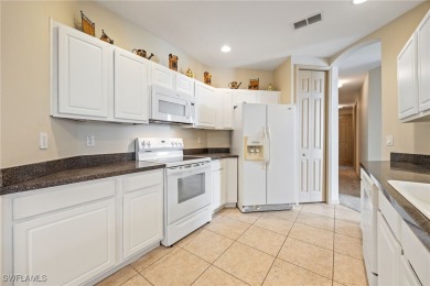 Maintenance-Free Living in Prime Naples Location - First Floor on Glen Eagle Golf and Country Club in Florida - for sale on GolfHomes.com, golf home, golf lot