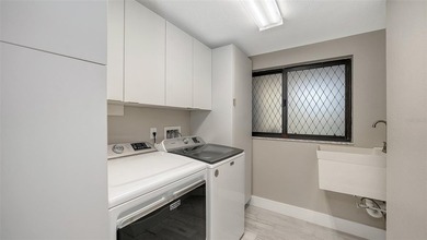 Step into coastal elegance in this fully renovated three-bedroom on Longboat Key Golf Club Resort in Florida - for sale on GolfHomes.com, golf home, golf lot