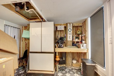 Tucked along the peaceful waters of Chincoteague Bay, this on Captains Cove Golf and Yacht Club in Virginia - for sale on GolfHomes.com, golf home, golf lot