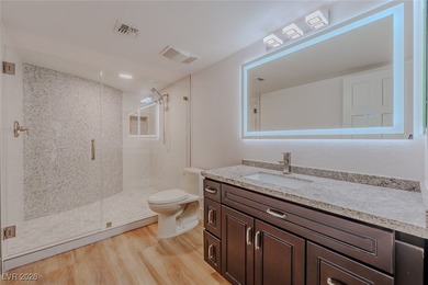 STUNNING REMODEL ON DOUBLE FAIRWAY OF GOLF COURSE OVERLOOKING on Spanish Trail Golf and Country Club in Nevada - for sale on GolfHomes.com, golf home, golf lot