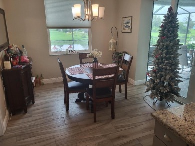 As you enter this 3 bedroom,  2 &1/2 bath, 3 car garage, canal on Rotonda Golf and Country Club - Long Marsh  in Florida - for sale on GolfHomes.com, golf home, golf lot