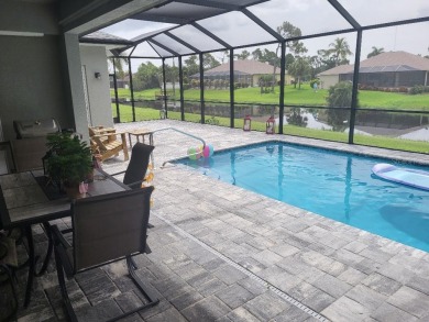 As you enter this 3 bedroom,  2 &1/2 bath, 3 car garage, canal on Rotonda Golf and Country Club - Long Marsh  in Florida - for sale on GolfHomes.com, golf home, golf lot