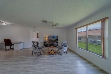 Welcome home to this light and airy 2 bedroom/2 bathroom corner on Mainlands Golf Club in Florida - for sale on GolfHomes.com, golf home, golf lot