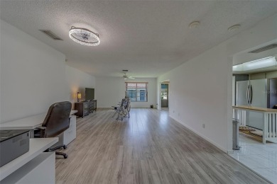 Welcome home to this light and airy 2 bedroom/2 bathroom corner on Mainlands Golf Club in Florida - for sale on GolfHomes.com, golf home, golf lot