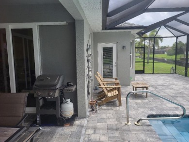 As you enter this 3 bedroom,  2 &1/2 bath, 3 car garage, canal on Rotonda Golf and Country Club - Long Marsh  in Florida - for sale on GolfHomes.com, golf home, golf lot
