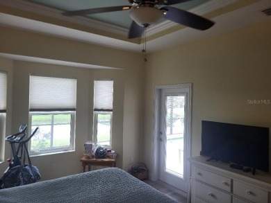 As you enter this 3 bedroom,  2 &1/2 bath, 3 car garage, canal on Rotonda Golf and Country Club - Long Marsh  in Florida - for sale on GolfHomes.com, golf home, golf lot