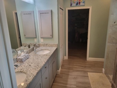 As you enter this 3 bedroom,  2 &1/2 bath, 3 car garage, canal on Rotonda Golf and Country Club - Long Marsh  in Florida - for sale on GolfHomes.com, golf home, golf lot