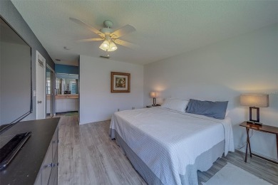 Welcome home to this light and airy 2 bedroom/2 bathroom corner on Mainlands Golf Club in Florida - for sale on GolfHomes.com, golf home, golf lot