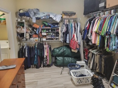 As you enter this 3 bedroom,  2 &1/2 bath, 3 car garage, canal on Rotonda Golf and Country Club - Long Marsh  in Florida - for sale on GolfHomes.com, golf home, golf lot