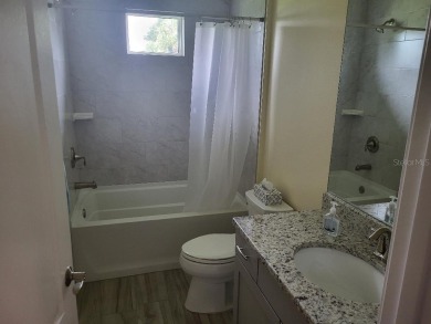 As you enter this 3 bedroom,  2 &1/2 bath, 3 car garage, canal on Rotonda Golf and Country Club - Long Marsh  in Florida - for sale on GolfHomes.com, golf home, golf lot