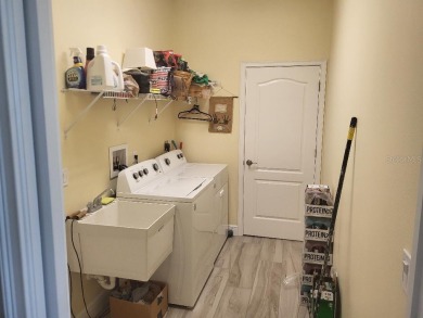 As you enter this 3 bedroom,  2 &1/2 bath, 3 car garage, canal on Rotonda Golf and Country Club - Long Marsh  in Florida - for sale on GolfHomes.com, golf home, golf lot