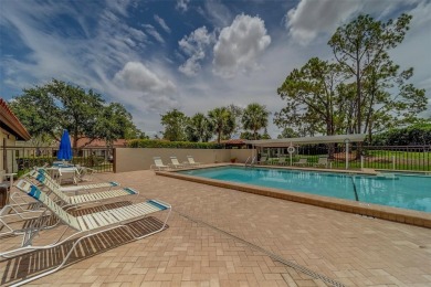 Welcome home to this light and airy 2 bedroom/2 bathroom corner on Mainlands Golf Club in Florida - for sale on GolfHomes.com, golf home, golf lot