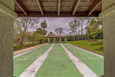 Welcome home to this light and airy 2 bedroom/2 bathroom corner on Mainlands Golf Club in Florida - for sale on GolfHomes.com, golf home, golf lot