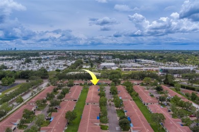 Welcome home to this light and airy 2 bedroom/2 bathroom corner on Mainlands Golf Club in Florida - for sale on GolfHomes.com, golf home, golf lot