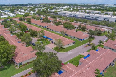 Welcome home to this light and airy 2 bedroom/2 bathroom corner on Mainlands Golf Club in Florida - for sale on GolfHomes.com, golf home, golf lot