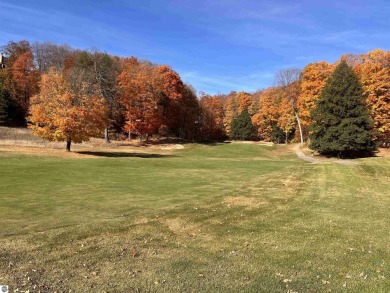 This parcel soaks up the views from hole #18 at the renowned on Shanty Creek Golf Course in Michigan - for sale on GolfHomes.com, golf home, golf lot