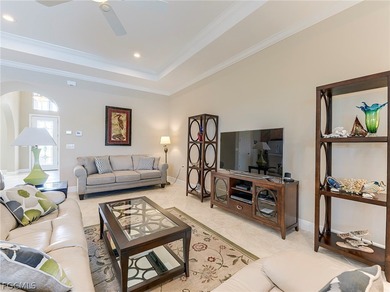 This gorgeous Florencia design, built by WCI, Pelican Preserve's on Pelican Preserve Golf Club in Florida - for sale on GolfHomes.com, golf home, golf lot