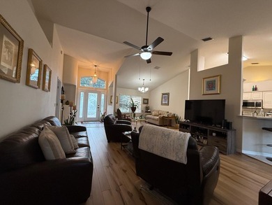 Step into this meticulously maintained three-bedroom, two-bath on The Grand Club Cypress Course in Florida - for sale on GolfHomes.com, golf home, golf lot