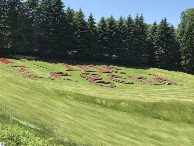 This parcel soaks up the views from hole #18 at the renowned on Shanty Creek Golf Course in Michigan - for sale on GolfHomes.com, golf home, golf lot