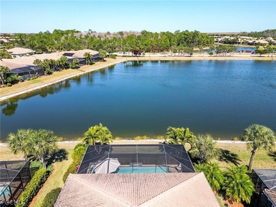 This gorgeous Florencia design, built by WCI, Pelican Preserve's on Pelican Preserve Golf Club in Florida - for sale on GolfHomes.com, golf home, golf lot