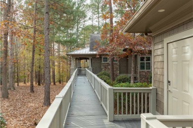 A must-see, luxurious townhome located in National Village at on Reynolds Lake Oconee - The Oconee in Georgia - for sale on GolfHomes.com, golf home, golf lot