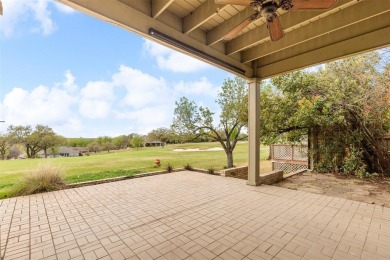 Homes of this caliber are rare! Experience luxury living in this on Pecan Plantation Country Club in Texas - for sale on GolfHomes.com, golf home, golf lot
