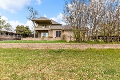 Homes of this caliber are rare! Experience luxury living in this on Pecan Plantation Country Club in Texas - for sale on GolfHomes.com, golf home, golf lot