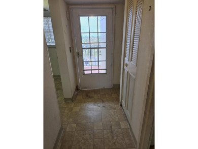 CONVENIENTLY LOCATED ACROSS FROM THE CLUBHOUSE & 2 POOLS, THIS on Poinciana Golf Club in Florida - for sale on GolfHomes.com, golf home, golf lot