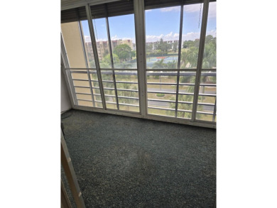 CONVENIENTLY LOCATED ACROSS FROM THE CLUBHOUSE & 2 POOLS, THIS on Poinciana Golf Club in Florida - for sale on GolfHomes.com, golf home, golf lot