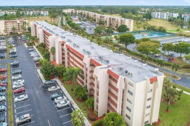 CONVENIENTLY LOCATED ACROSS FROM THE CLUBHOUSE & 2 POOLS, THIS on Poinciana Golf Club in Florida - for sale on GolfHomes.com, golf home, golf lot