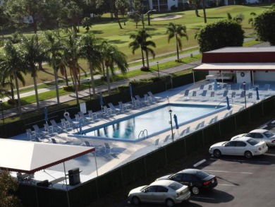 CONVENIENTLY LOCATED ACROSS FROM THE CLUBHOUSE & 2 POOLS, THIS on Poinciana Golf Club in Florida - for sale on GolfHomes.com, golf home, golf lot