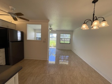 55 OR OLDER ONLYpletely renovated 1ST FLOOR UNIT. GOLF COURSE on Pine Lakes Golf Club in Florida - for sale on GolfHomes.com, golf home, golf lot