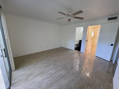 55 OR OLDER ONLYpletely renovated 1ST FLOOR UNIT. GOLF COURSE on Pine Lakes Golf Club in Florida - for sale on GolfHomes.com, golf home, golf lot