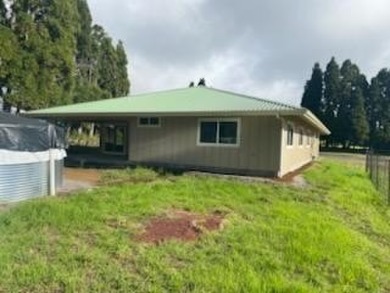 ONE OF THE FINEST HOMES WITH THE WOW FACTOR IN COOL VOLCANO on  in Hawaii - for sale on GolfHomes.com, golf home, golf lot