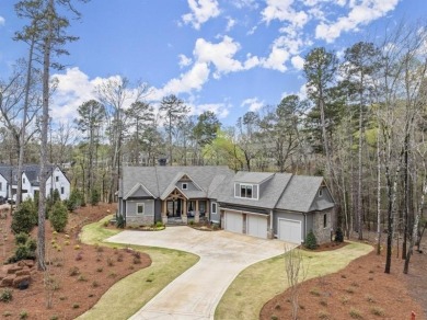 Indulge in the epitome of lakeside luxury with this exquisite on Reynolds Lake Oconee - The Oconee in Georgia - for sale on GolfHomes.com, golf home, golf lot