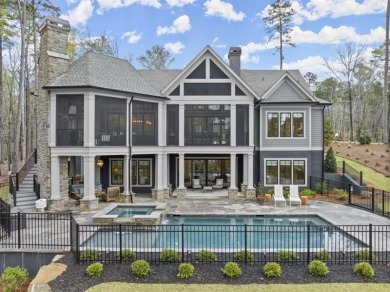 Indulge in the epitome of lakeside luxury with this exquisite on Reynolds Lake Oconee - The Oconee in Georgia - for sale on GolfHomes.com, golf home, golf lot