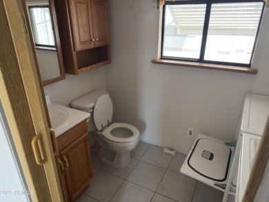 This property offers a great location in the Carriage Manor on Fountain of the Sun Country Club in Arizona - for sale on GolfHomes.com, golf home, golf lot