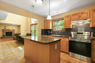 Step inside this 4-bed, 2.5 bath Colonial in the sought after on Country Club of the Poconos Golf Course in Pennsylvania - for sale on GolfHomes.com, golf home, golf lot