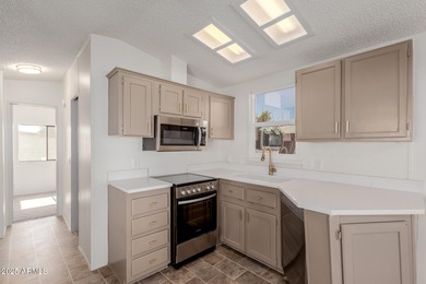 This property offers a great location in the Carriage Manor on Fountain of the Sun Country Club in Arizona - for sale on GolfHomes.com, golf home, golf lot