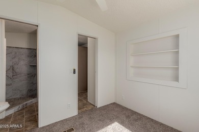 This property offers a great location in the Carriage Manor on Fountain of the Sun Country Club in Arizona - for sale on GolfHomes.com, golf home, golf lot