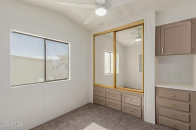 This property offers a great location in the Carriage Manor on Fountain of the Sun Country Club in Arizona - for sale on GolfHomes.com, golf home, golf lot